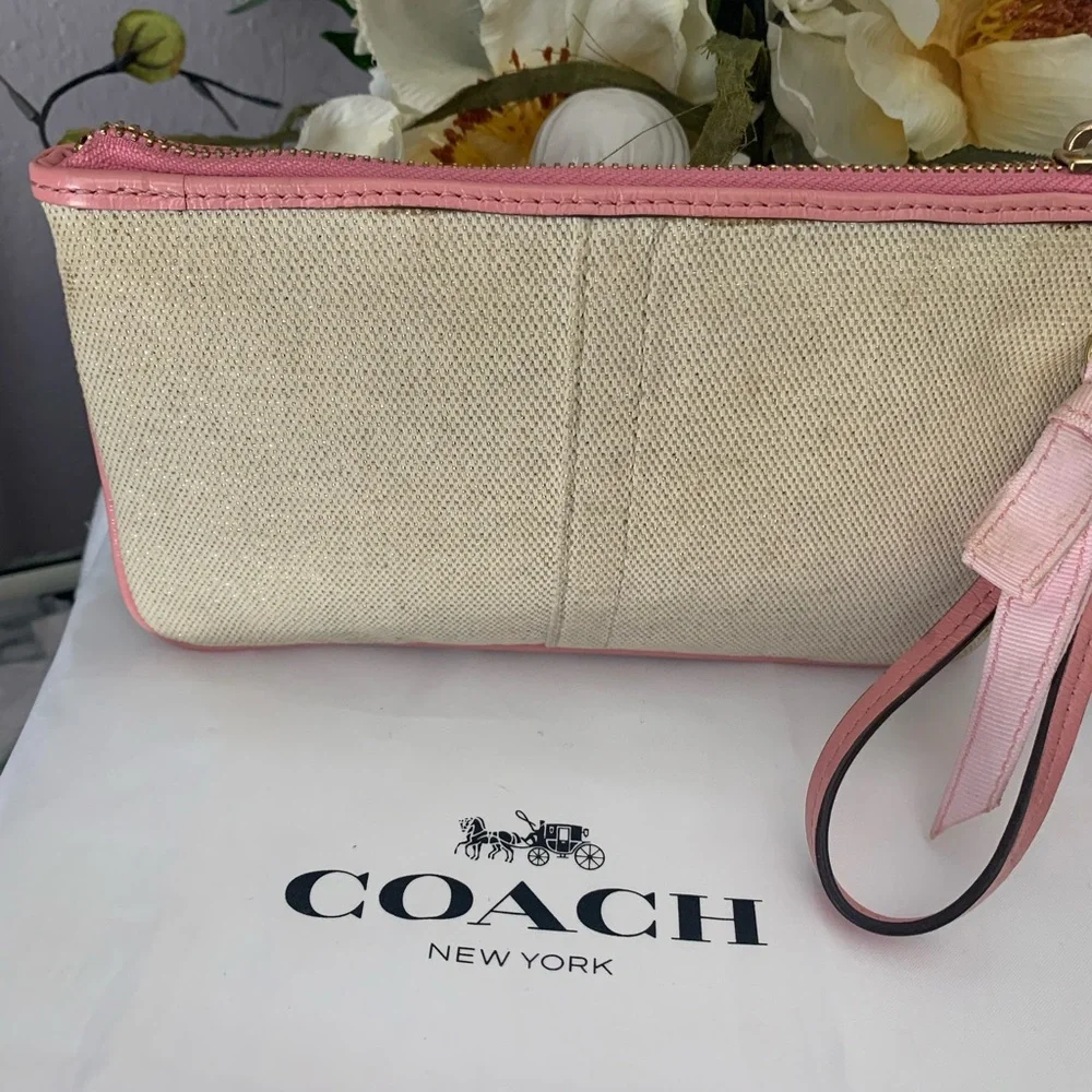 Limited Edition Coach Floral Canvas Wristlet Leather Trim and Bow
Charm - Picture 3 of 9